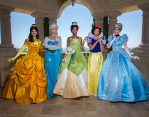 Disney princesses posing with children at a birthday party in San Jose.